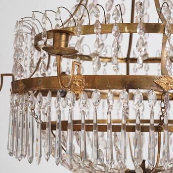 A late Gustavian gilt brass and cut glass seven-light chandelier, Stockholm, late 18th century.