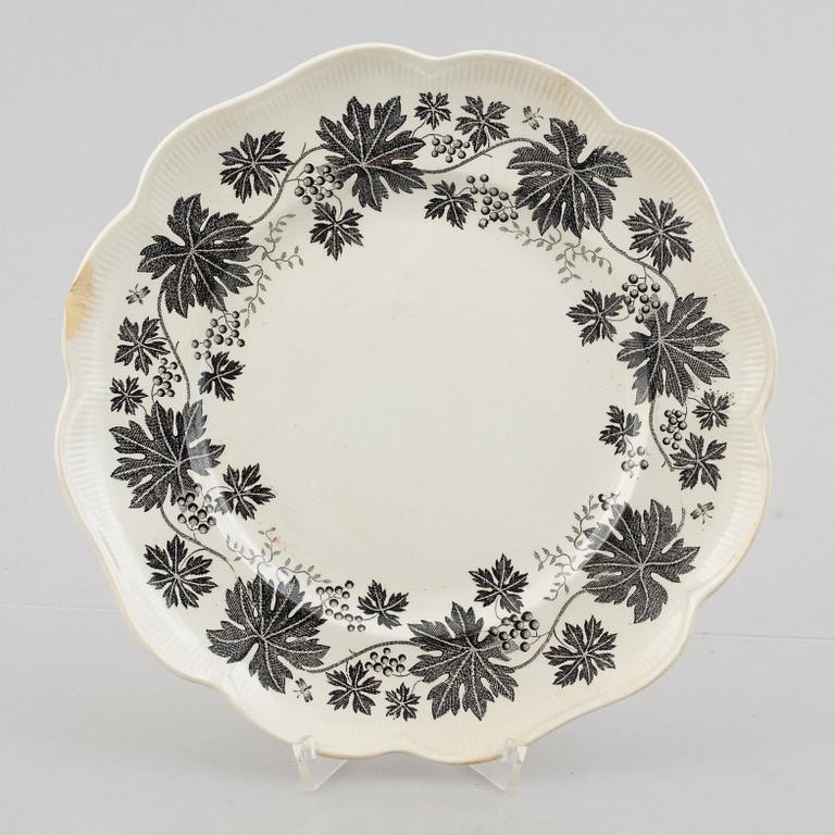 Arthur Percy, 57 pieces of a "Vinranka" creamware service, Gefle, Sweden, first half of the 20th century.