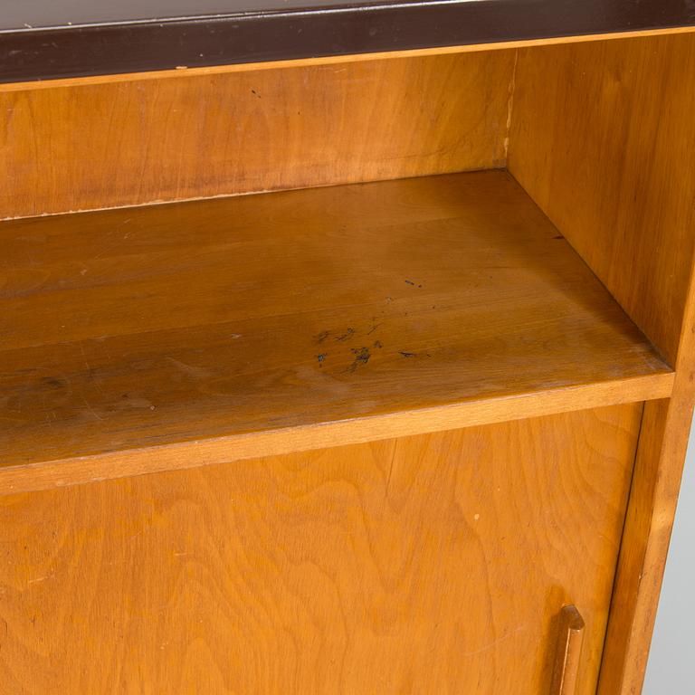 Baaritiski / tarjoilupöytä, Artekin piirustuskonttori, O.Y Huonekalu-ja Rakennustyötehdas A.B. 1950-luvun alku.