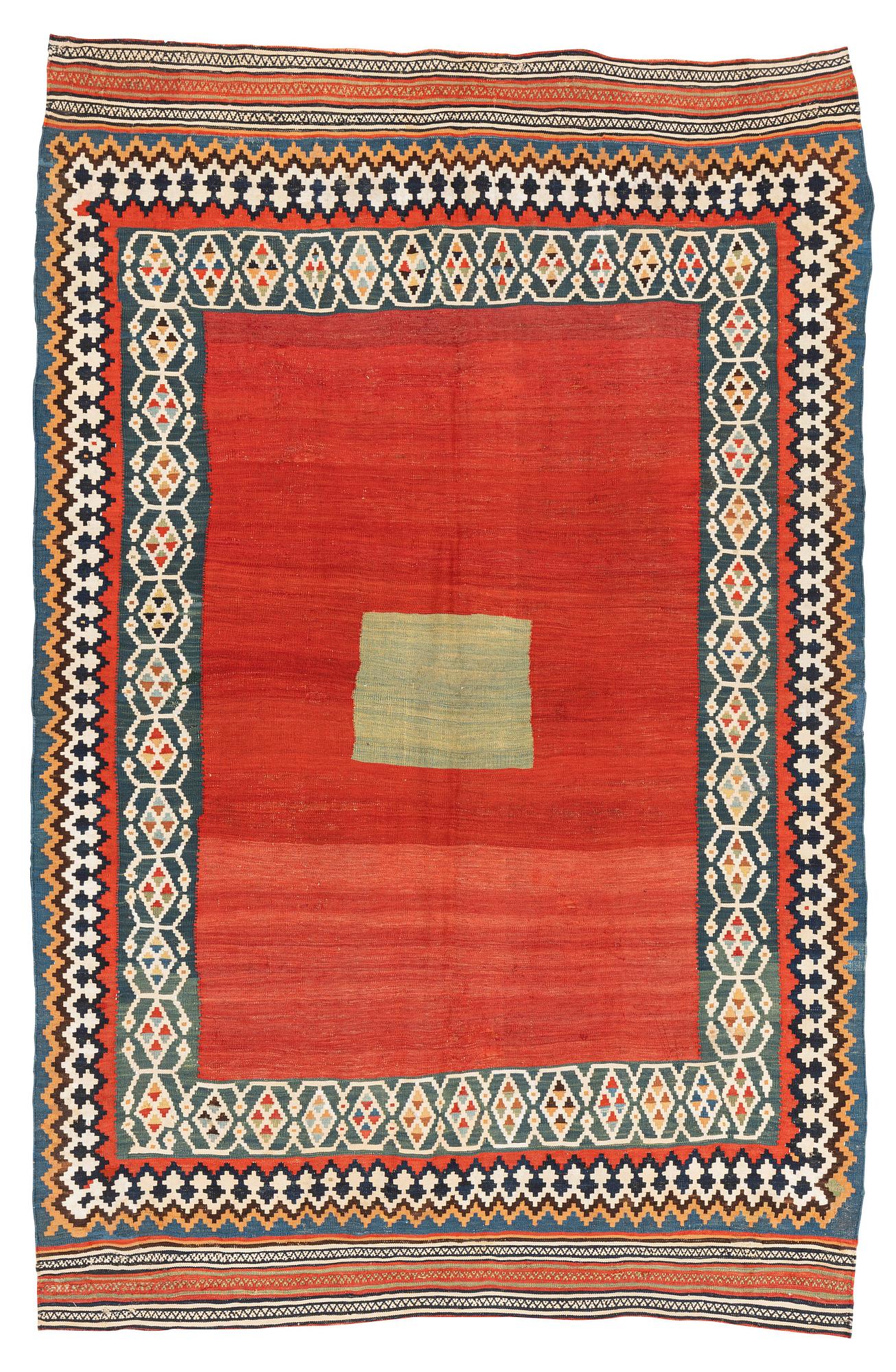 An antique Qashqai kilim rug, approximately 240 x 155 cm.