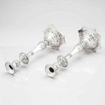 A pair 19th century Russian silver candlesticks, unidentified maker's mark, possibly Dimitry Agafanov (Kirov).