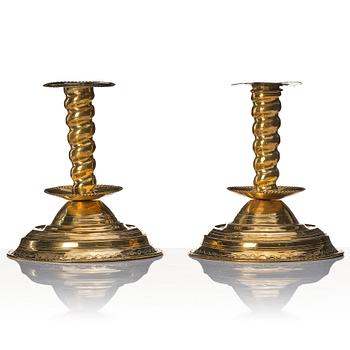 A pair of late Baroque candlesticks.