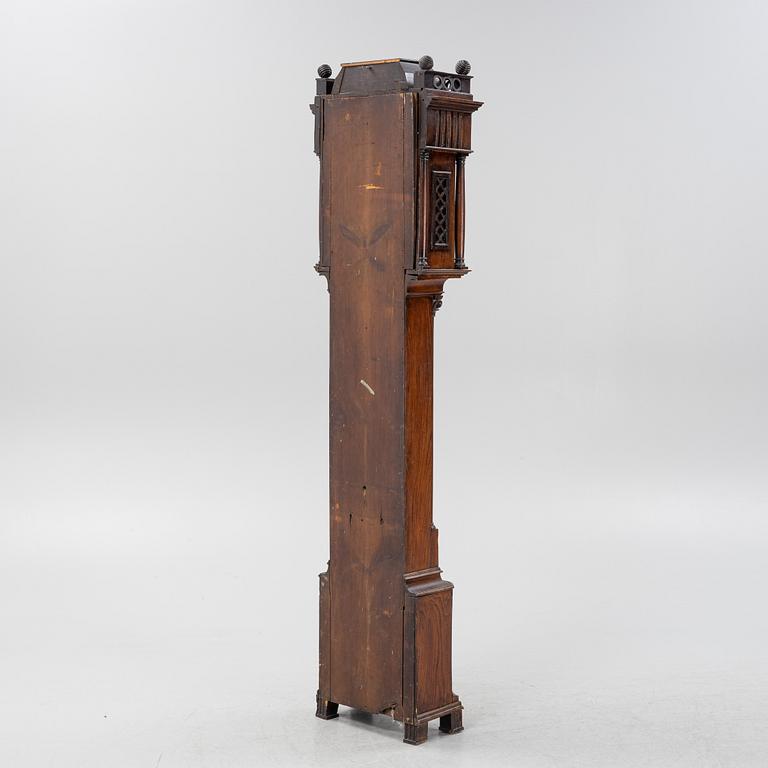 An oak longcase clock, 19th Century.