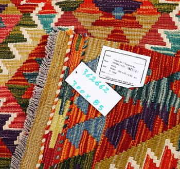 A Kilim runner carpet, c. 300 x 85 cm.