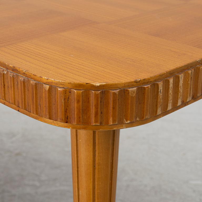 A Swedish Modern coffee table, 1940s.
