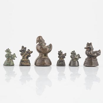 A group of six Burmese opium weights, 19th/20th Century.