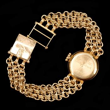 ARMBANDSUR, 18K guld med briljantslipade diamanter ca 0,60ct, Bernard Sylvain, Paris. Vikt ca 56g.