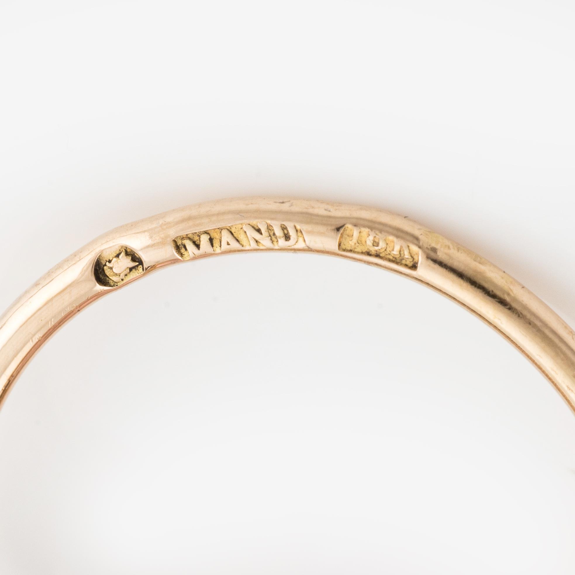 Ring med rosa turmalin och briljantslipade diamanter.