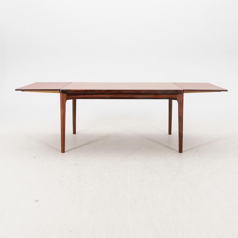 Henning Kjaernulf, a jacaranda dining table, Vejle stole- og Mobelfabrik, Denmark, 1960s.