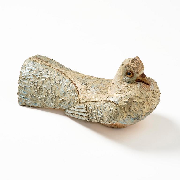 Tyra Lundgren, a chamotte stoneware sculpture of a bird, executed in her studio, Bredkvie, Gotland 1974.