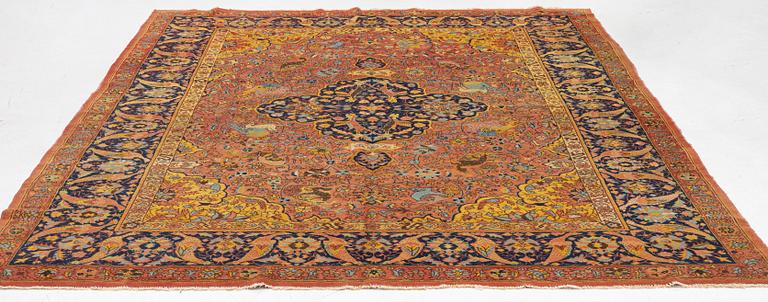 A carpet, antique/semi-antique Turkish/Indian, approx. 330 x 234 cm.