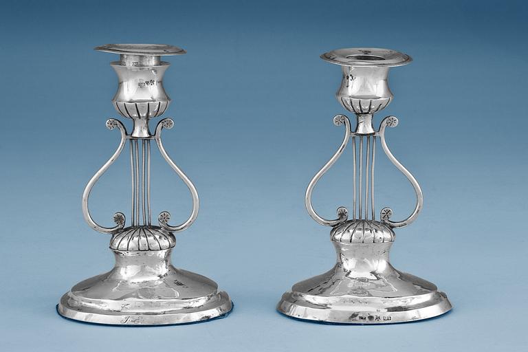 A PAIR OF CANDLESTICKS.