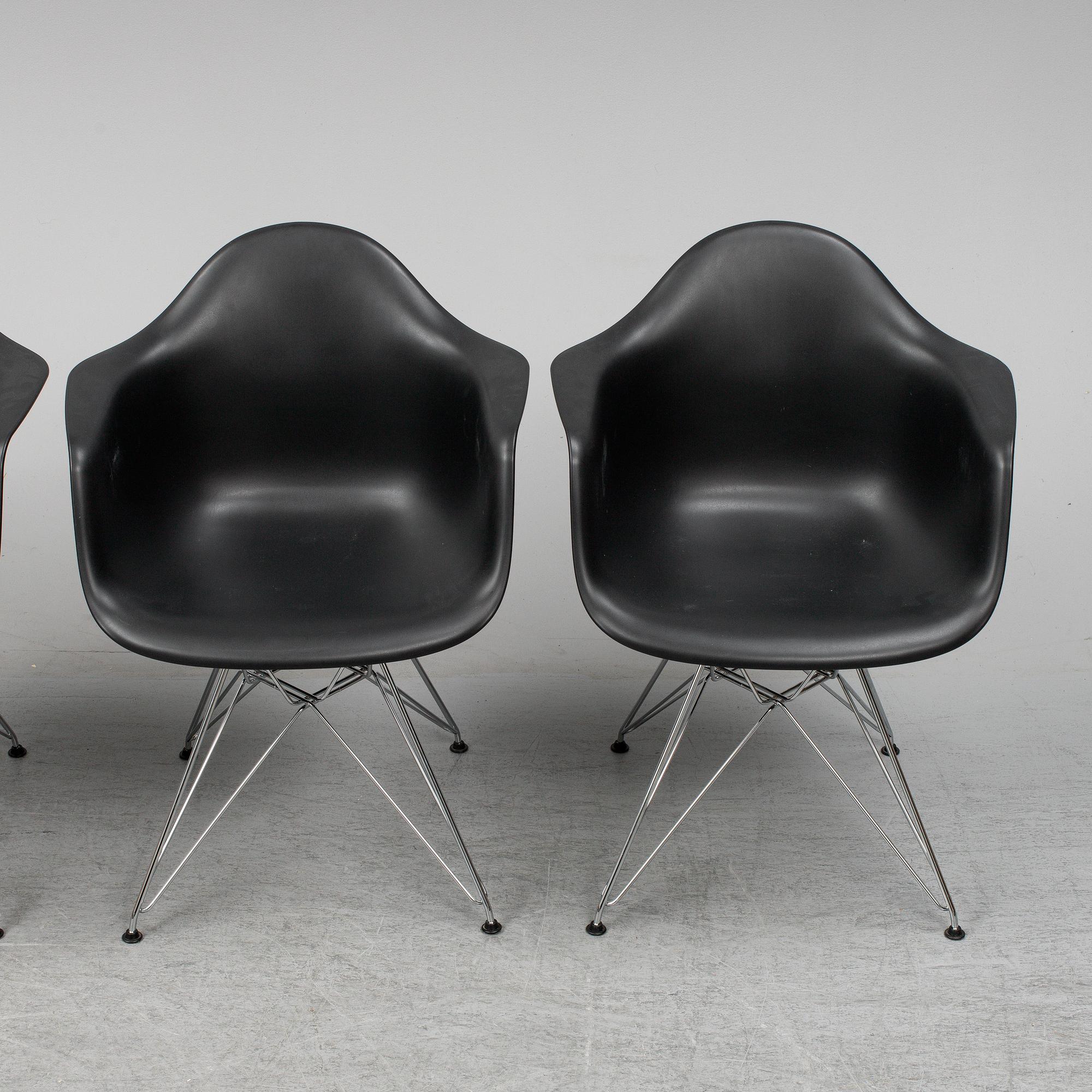 CHARLES AND RAY EAMES,  4  Eames Plastic Armchair, Vitra 2010.