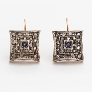 A pair of 14K gold earrings with rose-cut diamonds and sapphires.