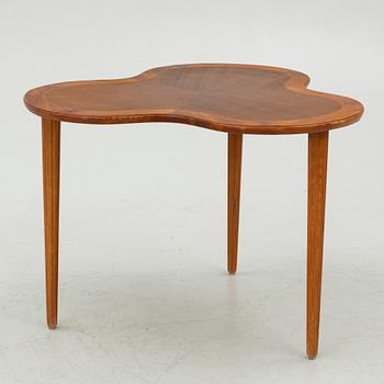 A Swedish Modern coffee table, mid-20th century.
