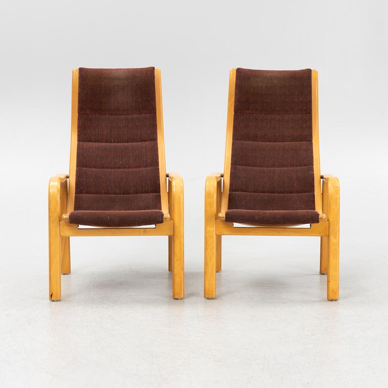Yngve Ekström, a pair of armchairs, Swedese, late 20th century.