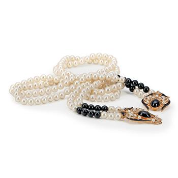 677. OSCAR DE LA RENTA, a two strand decorative pearl necklace in black and white.