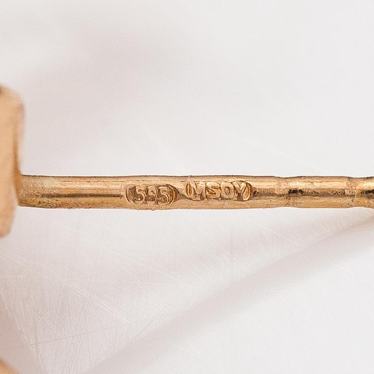 A pair of 14K gold earrings with diamonds ca 0.14 ct in total.