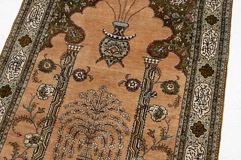 A silk Quum rug, c. 155 x 103 cm.