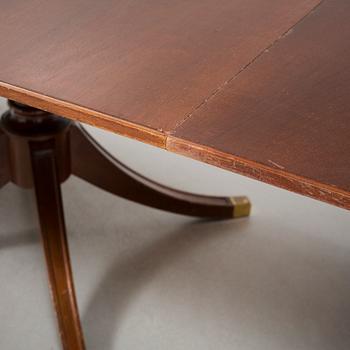 A diningroom table from the second quarter of the 20th century.