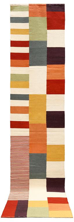 A  kilim runner, approximately 449 x 82 cm.