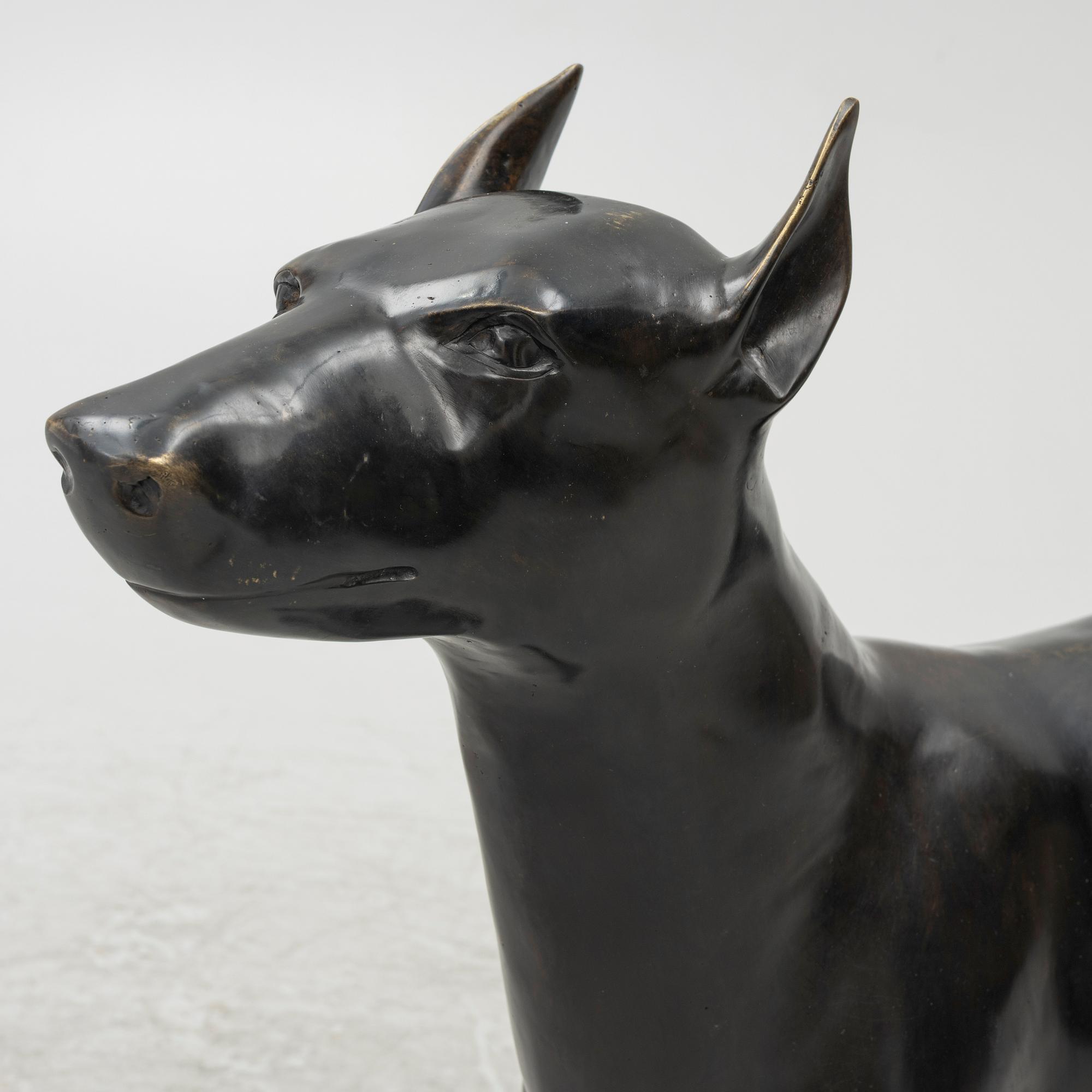 A decorative sculpture of a dog, 20th/21st century.