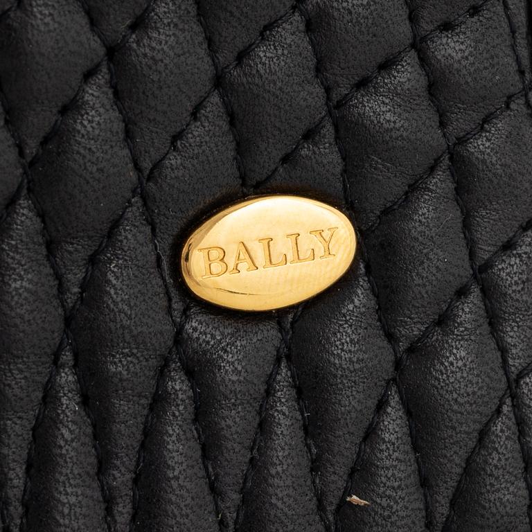 Bally, a quilted black leather bag.