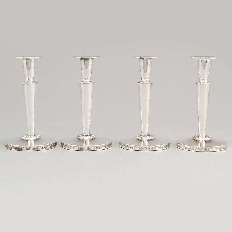 a set of four silver candlesticks by Ceson Gothenburg 1985-1987.