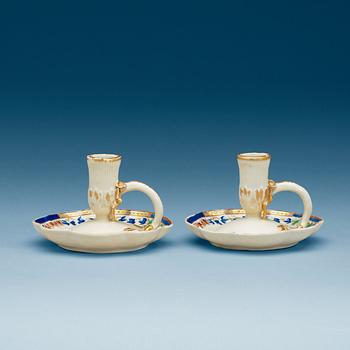 1766. A pair of candle sticks, Qing dynasty, Jiaqing (1796-1820).