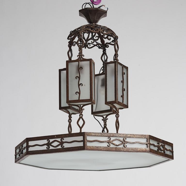 Carl Westman, attributed to, a wrought iron and frosted glass Art Nouveau chandelier, Sweden ca 1915.