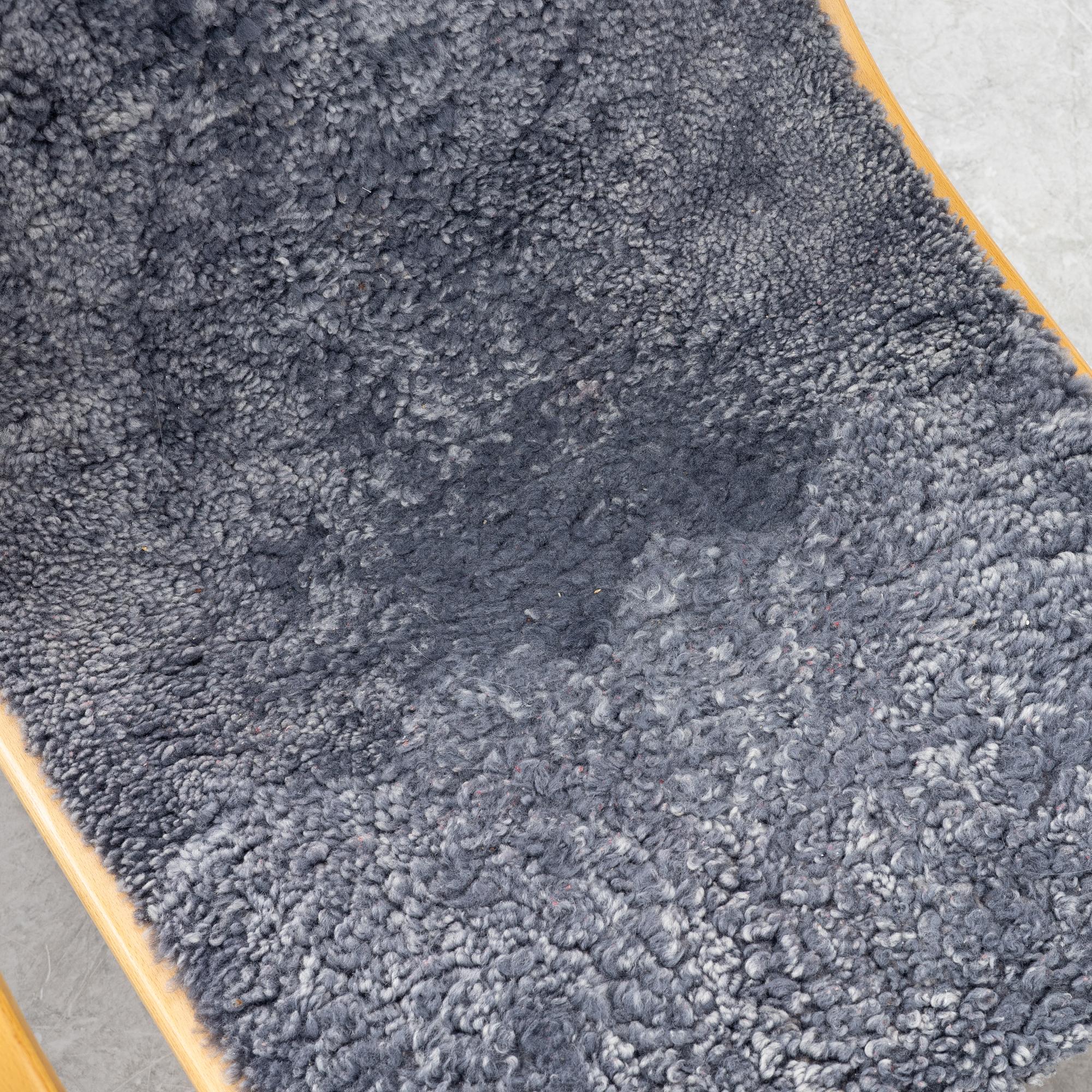 Yngve Ekström, armchair and footstool, "Lamino", Swedese.