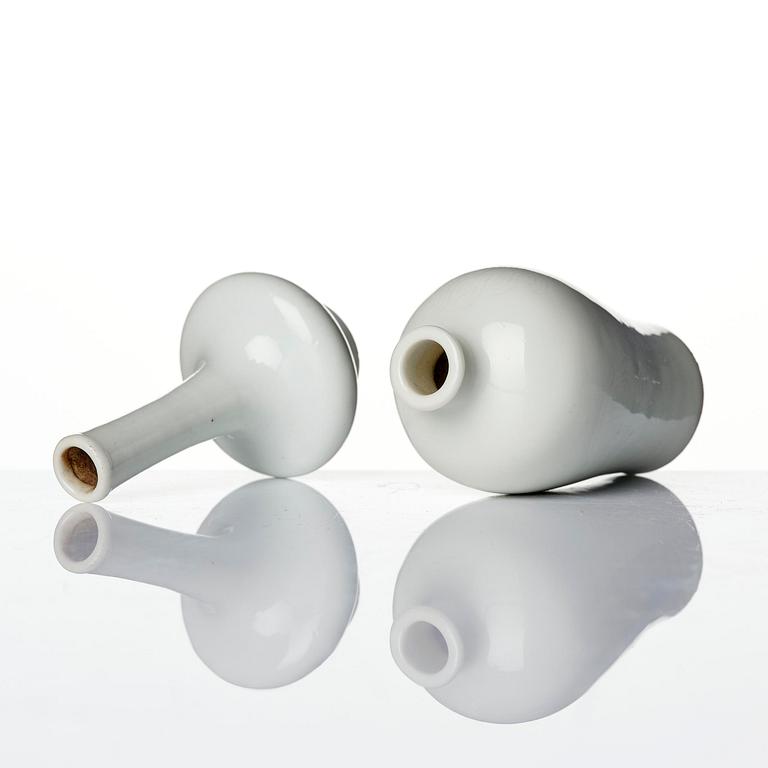A pair of white glazed vases, Qing dynasty, 18th century.