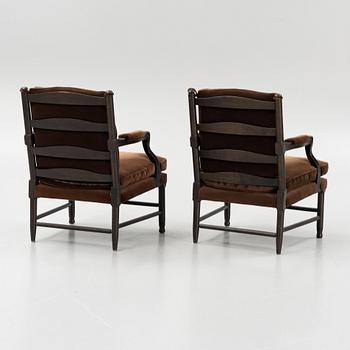 A pair of Gripsholms armchairs, Norell Möbler AB, Sweden.