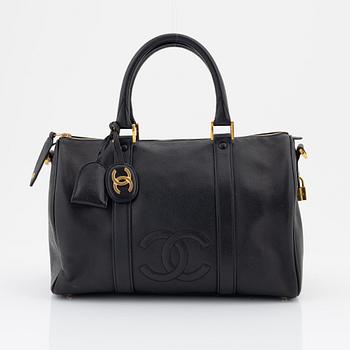Chanel, a black caviar leather 'Boston bag'.