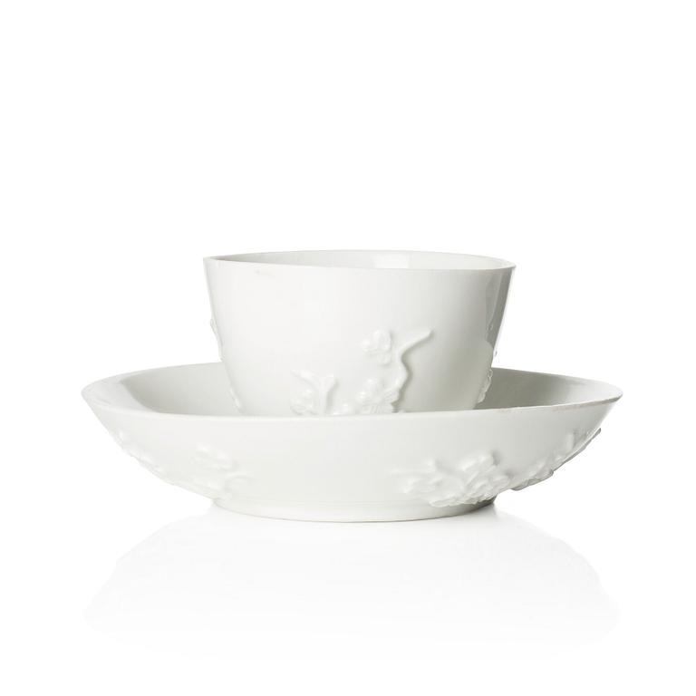 A blanc de Chine cup with saucer, Meissen, 18th century.