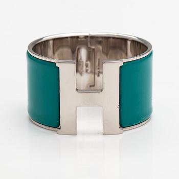 Hermès, A "H click" bracelet made of metal and enamel. Marked Hermès, S, Made in France.