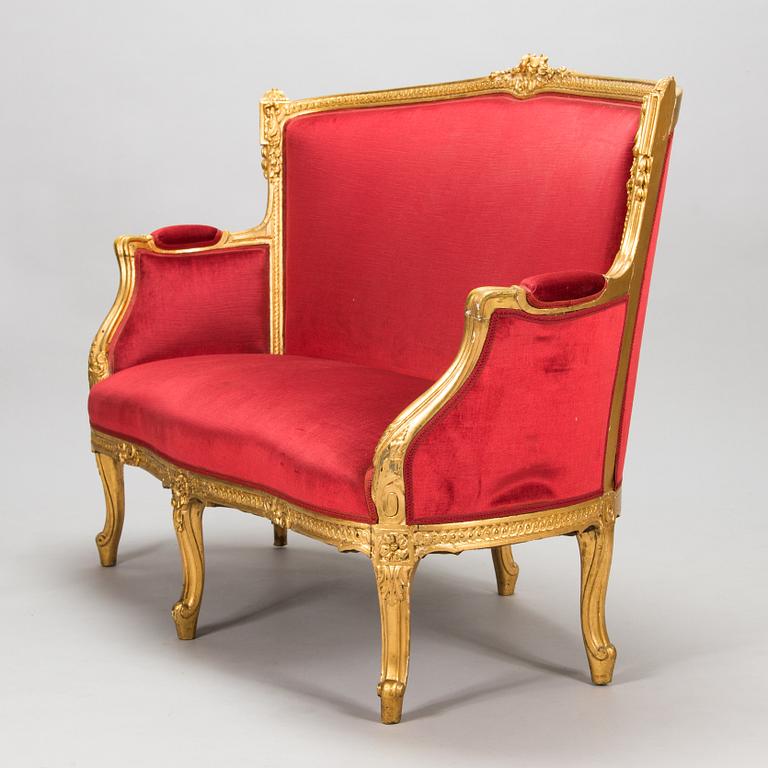 A late 19th century sofa in Louis XVI style.