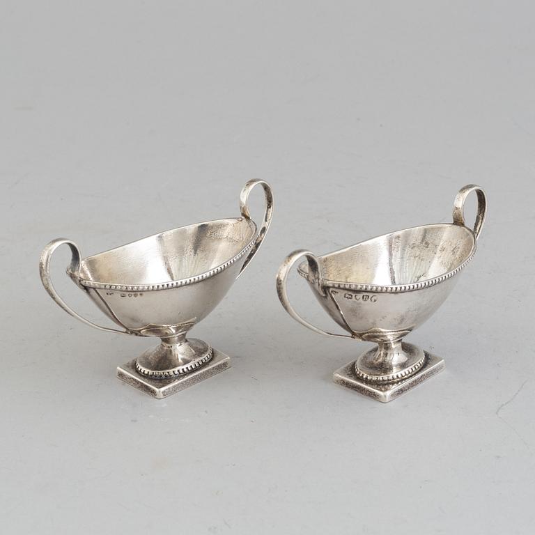 a pair of silver salt cellars, London, 1877.