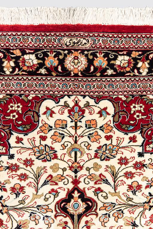 A carpet, Silk Qum, ca 116 x 75 cm.