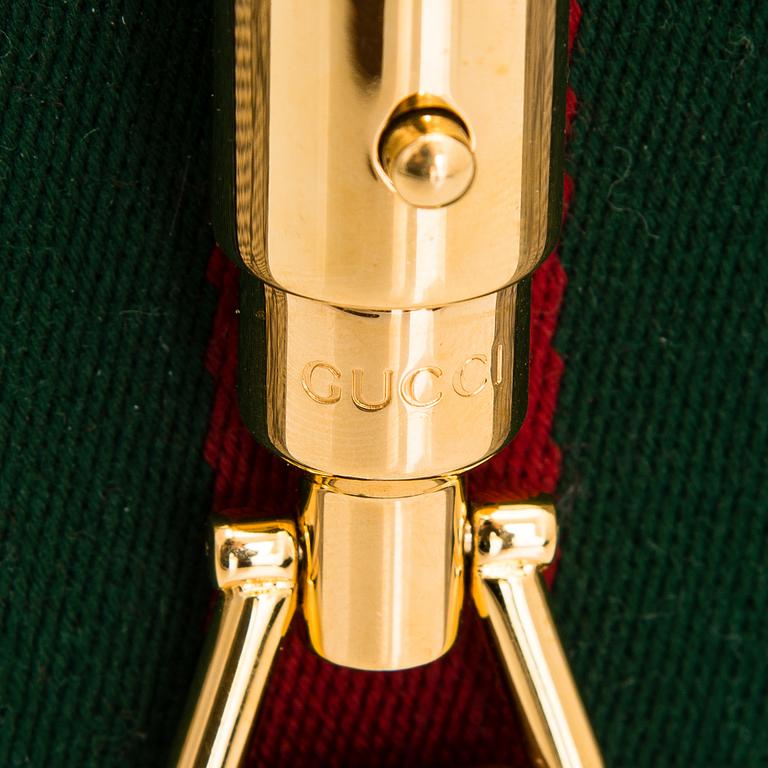 Gucci, a monogram 'Jackie' Bag.