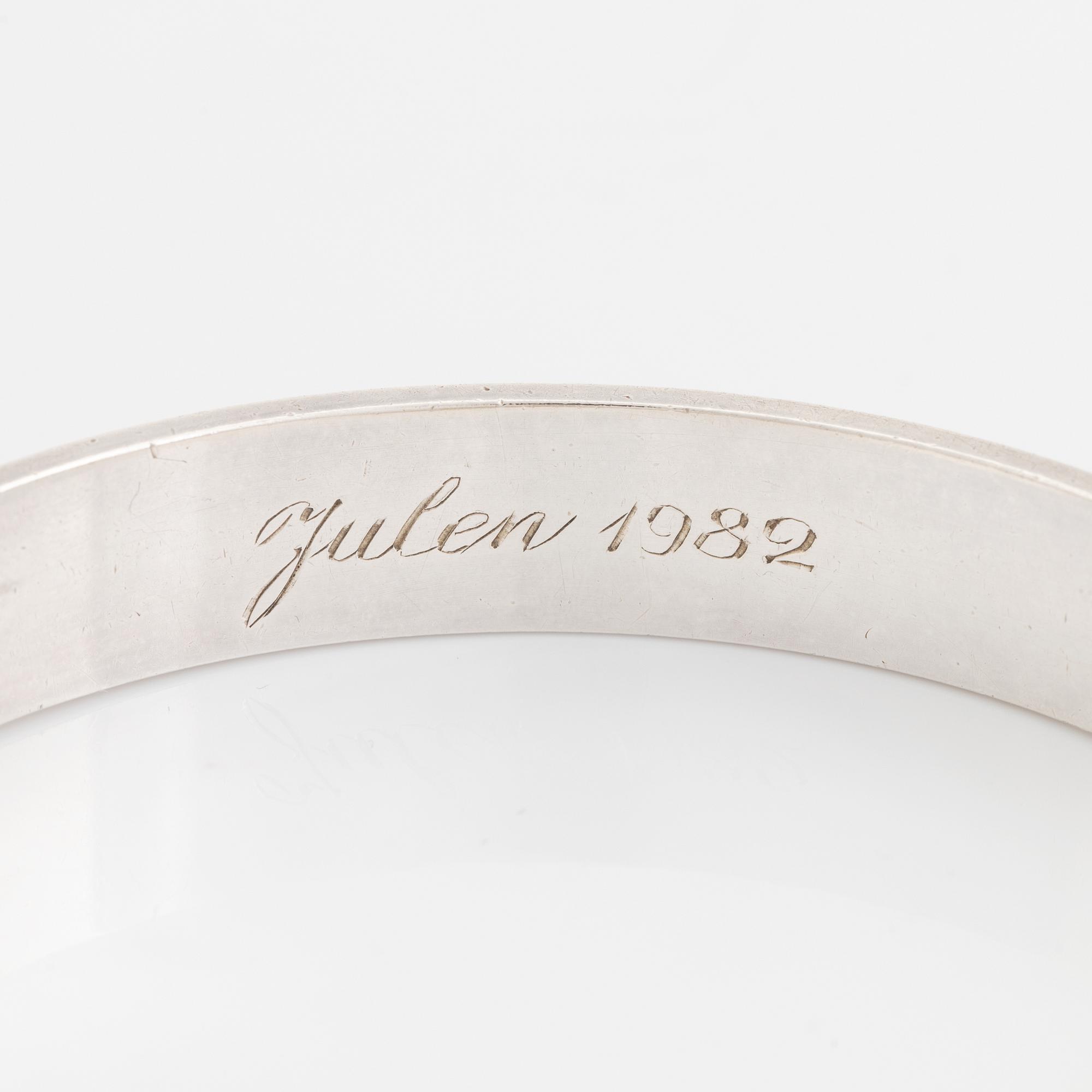 Karl-Ingemar Johansson a silver bracelet.