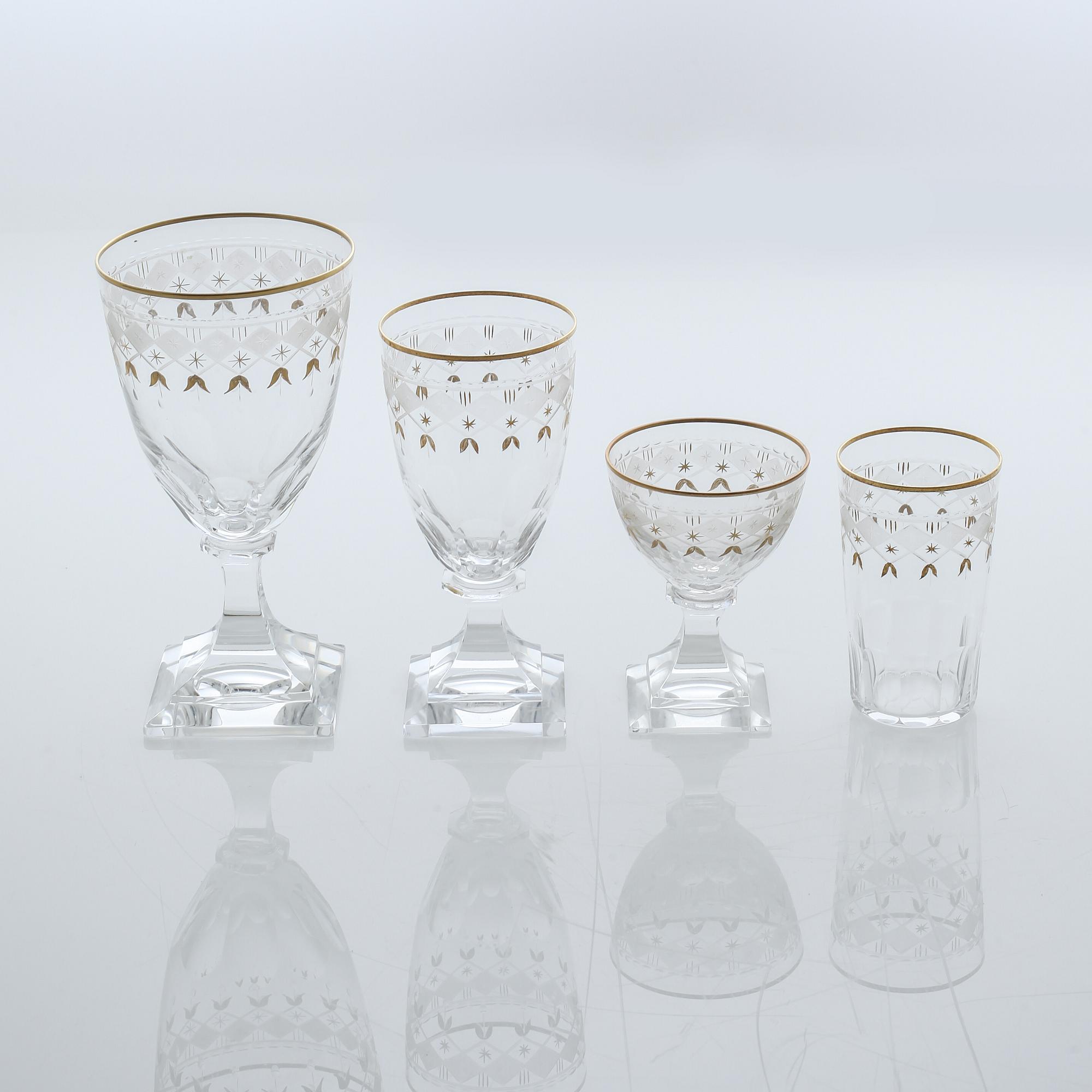 A glass tableware set of 38 pcs, "Odelberg Junior" by Kosta, second quarter of the 20th century.