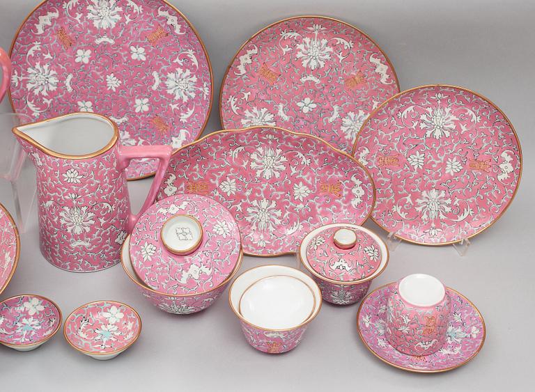 A pink ground Lotus service, China, early 20th Century. (137 pieces).