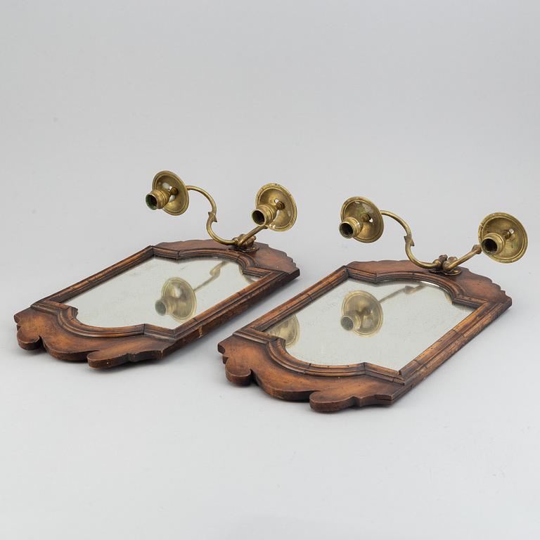 A pair  century wood and brass mirror wall sconces for two candles.c. 1900.