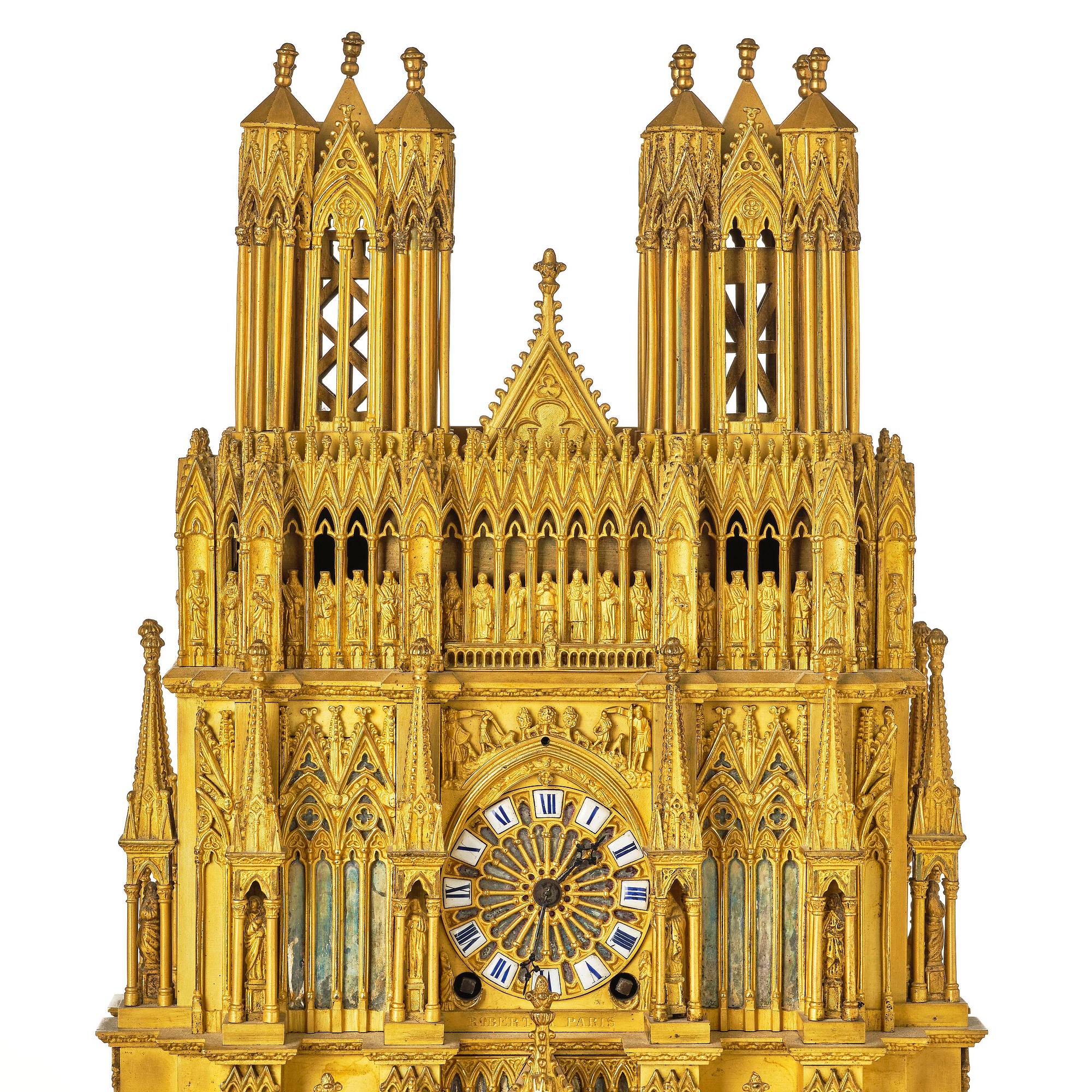 A Charles X ormolu mantel clock modelled as the Cathedral of Reims, Paris, 1820's.