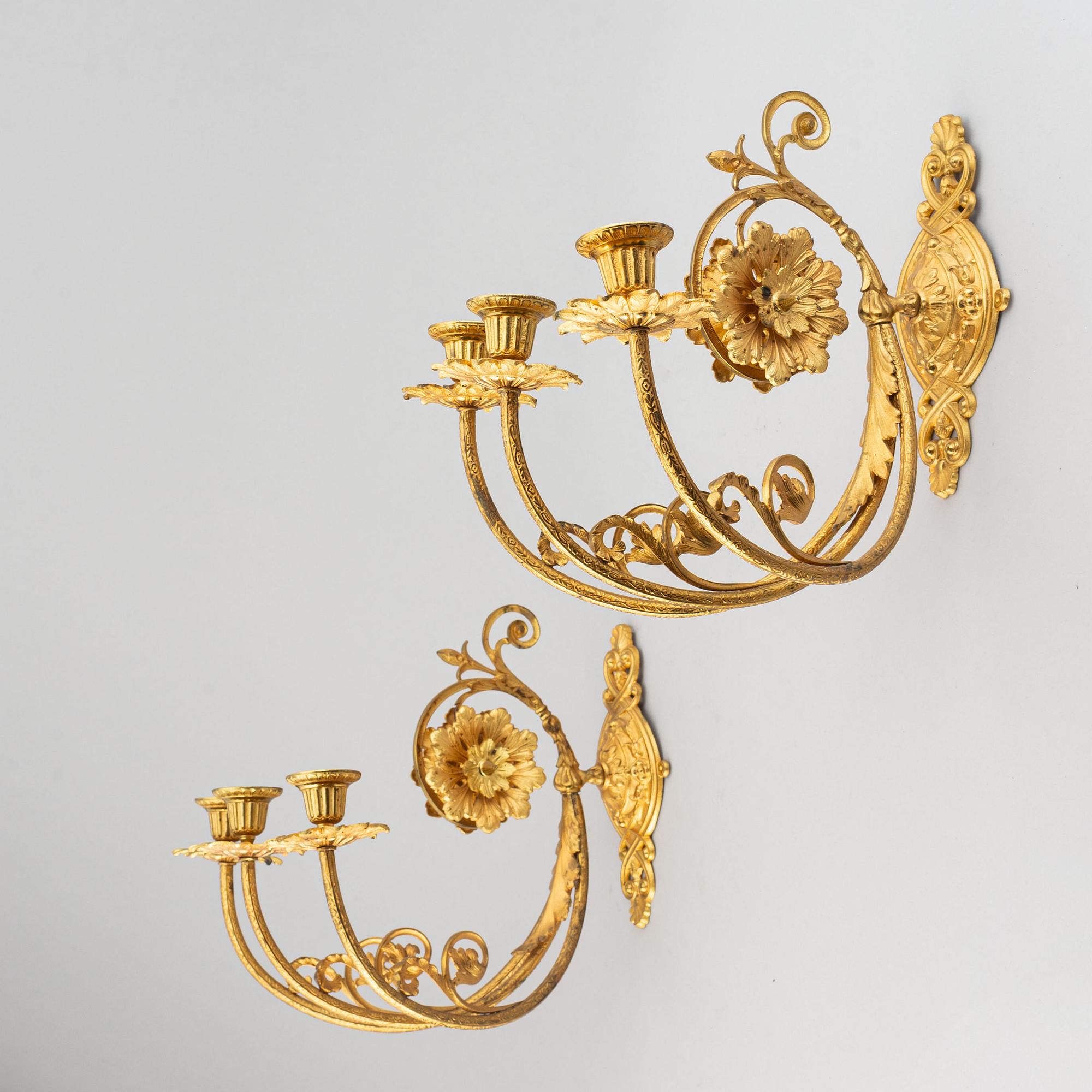 A pair of wall sconces from the late 19th century.