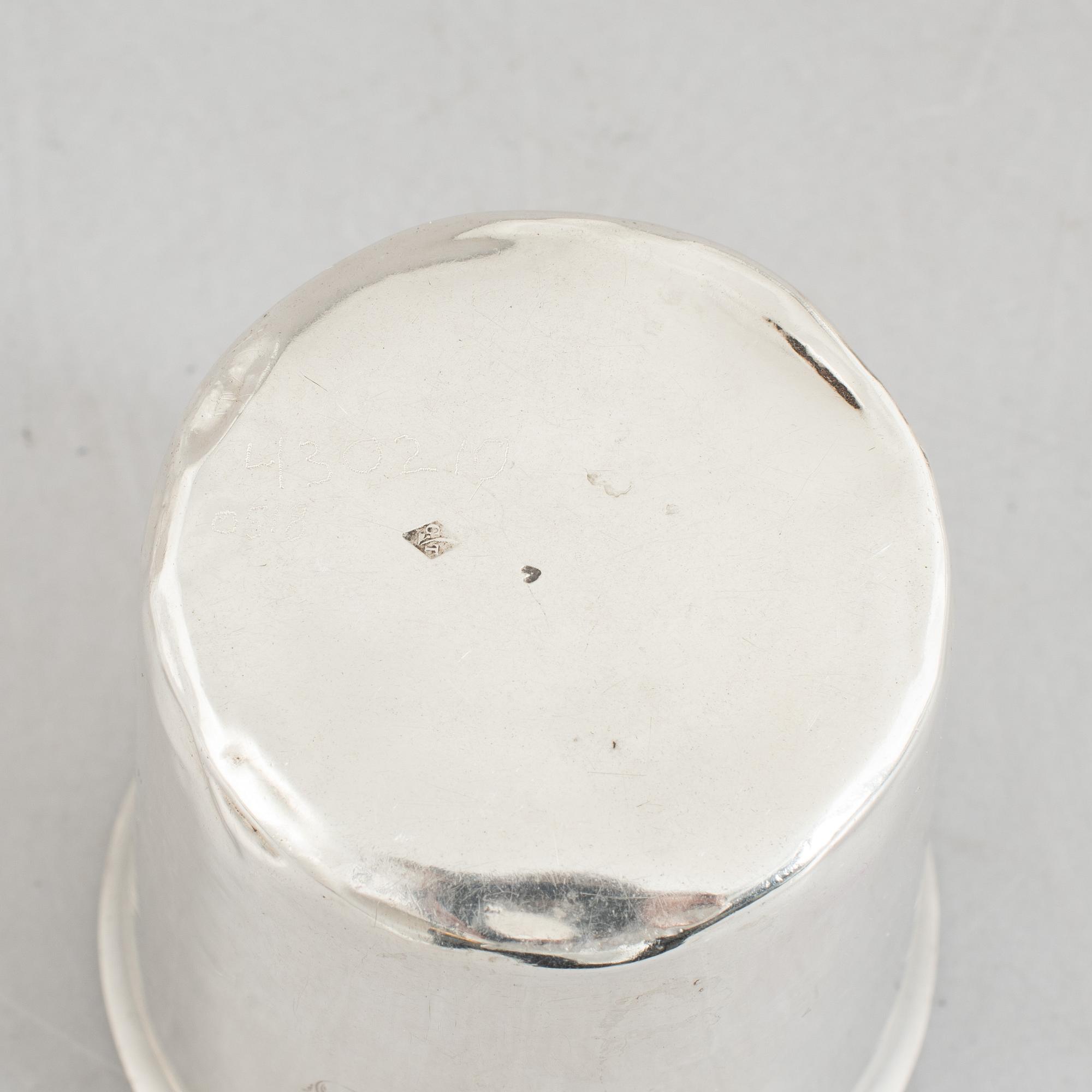 Four French silver beakers, Paris, 19th Century.