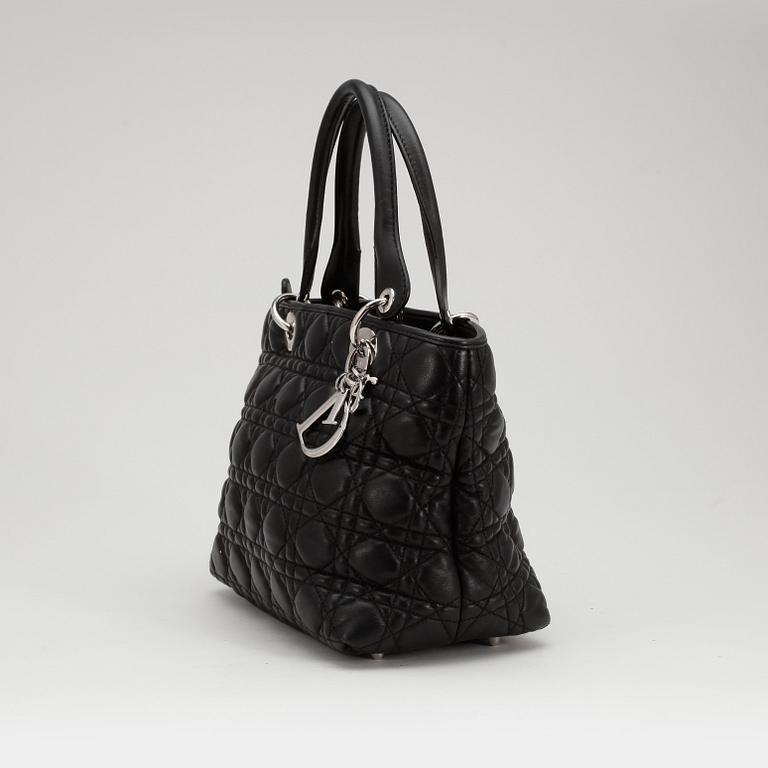 CHRISTIAN DIOR, a black leather "Lady Dior" bag.
