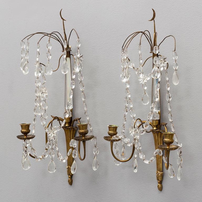 A pair of Gustavian style wall sconces, early 20th Century.