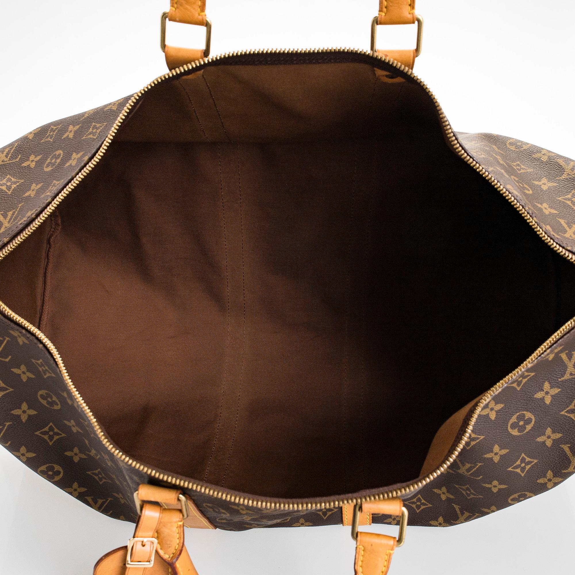 Louis Vuitton, a Monogram Canvas 'Keepall 55' bag.
